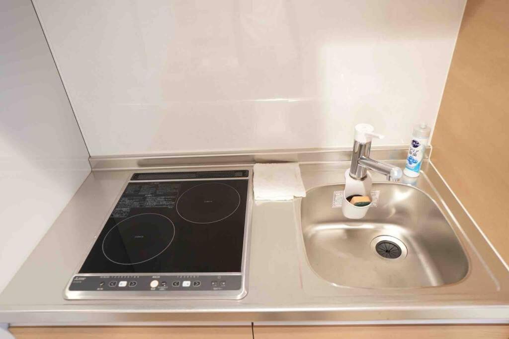 大阪市场步行一分钟酒店 Apartamento